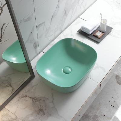 China Easy Clean Wash Basin Sanitary Ware Matt Green Modern Ceramic Hotel Hand Basin Vanity Cabinet Lavatory Basin for sale