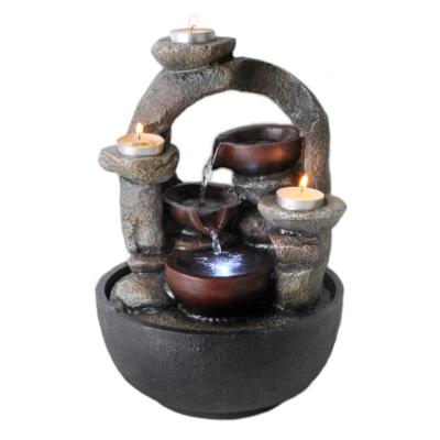 China Indoor Candle Light Waterfall Fountain Resin Water Feature Occasional Stones for sale