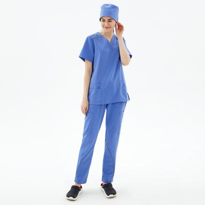 Κίνα Wholesale Good Quality Fashionable Nurse Uniform Medical Scrub Spandex Medico Stretch Top+Pant Scrubs Uniforms προς πώληση