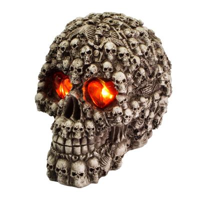 China Resin Horror Supplies Decor Plastic Led Shiny Skull Halloween Decoration for sale