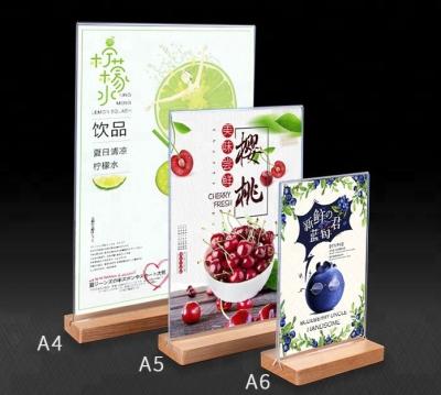 China Eco - Friendly Acrylic Sign Holder 8.5 x 11 With Wooden Base Wholesale Menu Holder for sale