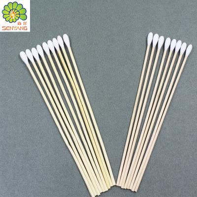 China Medical Sterile Wooden Cotton Tilted Applicator for sale