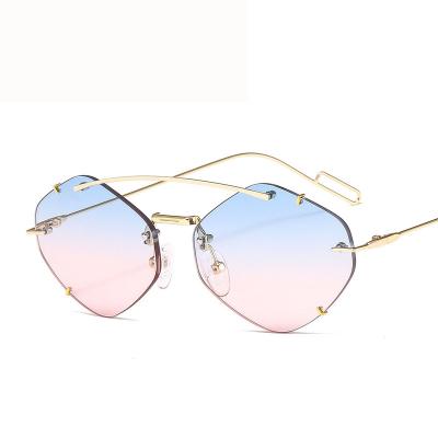 China Fashion Sunglasses 6604 Dropshipping metal frameless sunglasses modern catwalk customized sunglasses men women small frame for sale