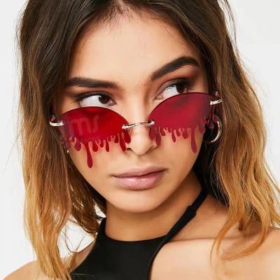 China Fashion Sunglasses 5103 Rimless Fashion Sunglasses Woman Trendy Tears Shaped Female Designer Metal Frameless Oculos De Sol Sun Glass Brand for sale