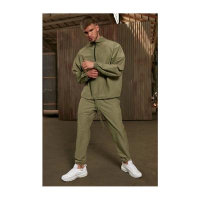 China Factory Direct Breathable Custom Sports Casual Loose Pullover Wear Lightweight Nylon Jacket Tracksuit Set for sale