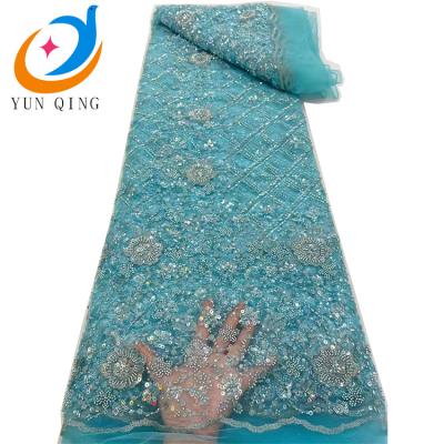 China Factory price 3D wedding dress lace fabric African noble beads and stones french net lace mesh materials wedding fabrics for women for sale