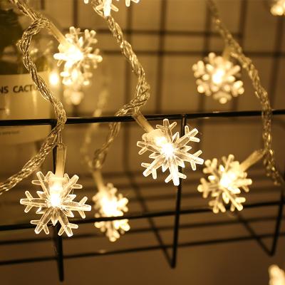 China Hot Selling Recommended LED Snowflake String Garland Light Snowflake Shape String Curtain Lights Led Party Decoration for sale