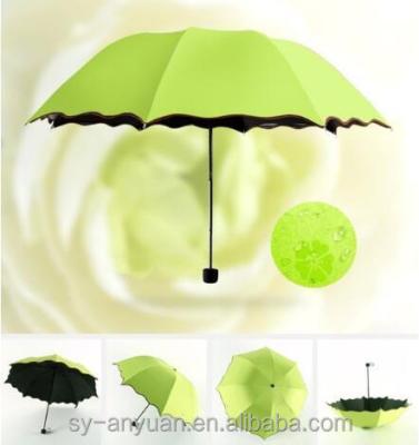 China Outdoor Use Printing Appear When Wet Rain Magic Umbrella 3Fold Umbrella for sale