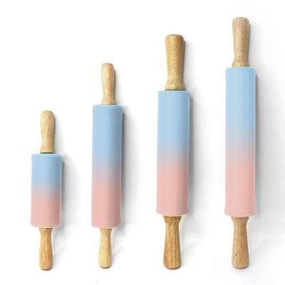 China Silica Gel Flour Sticker Handle Roller Sustainable Rolling Baking Solid Wood Baking Tool for sale