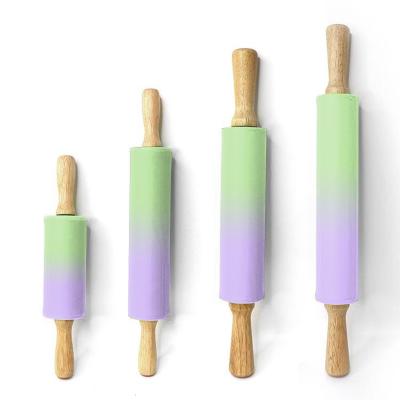 China Non Sustainable Stick Outdoor Silicone Pin With Wooden Handle for sale