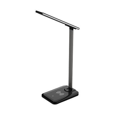 China Modern Modern Desk Lamp With Left USB Touch Charging Wireless Charging Pad Learning Reading Led Desk Lamp for sale