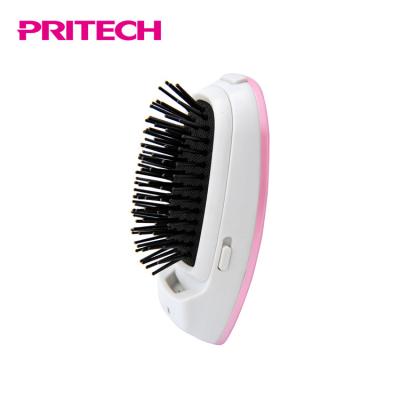 China Battery Operated Cushion PRITECH Ionic Vibration Remove Static Hair Brush for sale