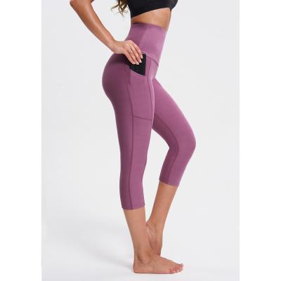 China New Women's Custom Logo Compression Pants Elastic Quick-Dry Sports Yoga Tight Breathable Capris Women's Sports Hip Peach Running Capris for sale