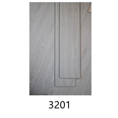 China Modern Fireproof SPC Vinyl Flooring Wood Grain Easy Installation Wholesale Flooring Sheet for sale