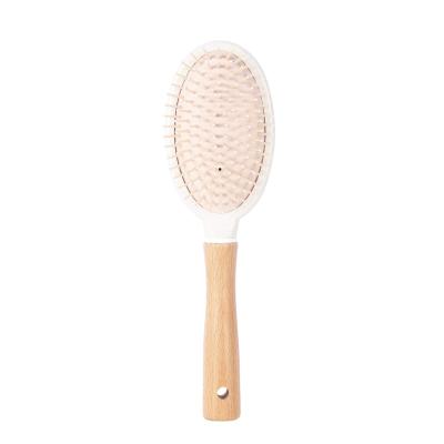 China sweet & Comfortable Wholesale Nylon Hair Comb Plastic Bristle Detangling Brush With Wooden Handle for sale