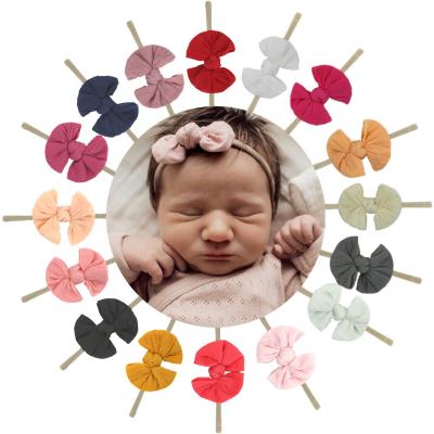 China Custom Newborn Tiny Nylon Bow Hair Elastic Baby Headbands Accessories Elastic Nylon Headbands For Baby Headbands for sale