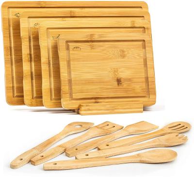 China Sustainable Amazon Hot Sell Bamboo Wood Cutting Board Set With Holder Utensil For Kitchen for sale