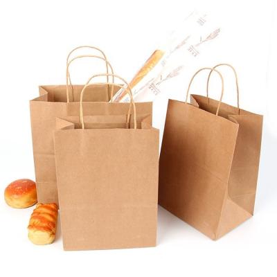 China Jinghong Recyclable Spot Packaging Kraft Paper Bag Printing Logo Advertising Portable Paper Bags for sale