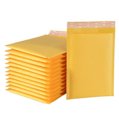 China shoes & Clothing Yellow Kraft Paper Bubble Bag Express Logistics Tote Bag Thickened Bubble Envelope Bags for sale