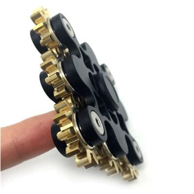 China Metal Nine Tooth Linkage Spinner Fidget Toy for Adults' Stress and Anxiety Relief for sale