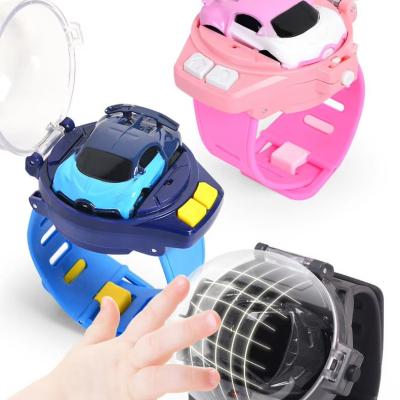 China Kids Mini RC Car Watch 2.4 GHz Cartoon RC Racing Car USB Charging 4 Channels for Kids for sale