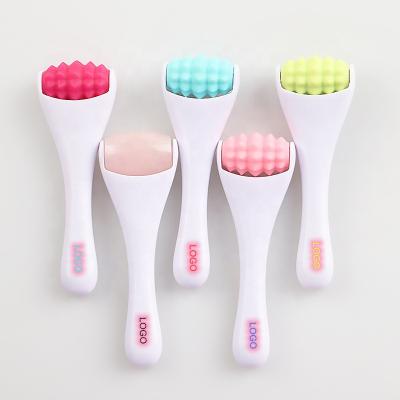 China Small MOQ Mini Handheld Silicone Roller Massager Roller Facial Massager Anti Aging Ball Face Skin Care and Eye Relaxation Massager Tool for sale