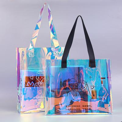 China Custom Large Logo Holographic Transparent Makeup Bag Women Shopping Bag Fashion Logo Clear PVC Bag for sale