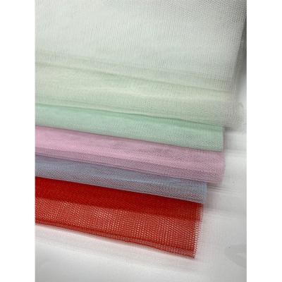 China Breathable Custom Patterns Degradation Chemical Resistance Luxury Wedding Tulle Fabric for sale