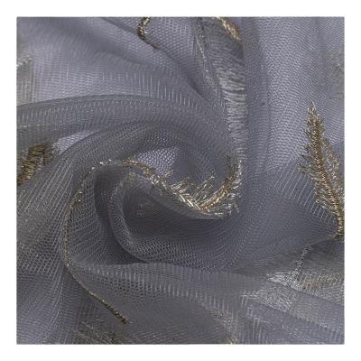 China Breathable Silver Mesh Feather Bronzing Print Tulle Fabric for sale