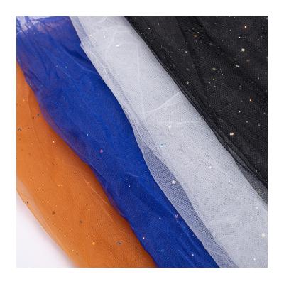 China Art Style Breathable Multicolor Bronzing Soft Tulle Fabric For DIY Decoration for sale