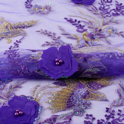 China Viable most popular floral gorgeous 3d birds pattern elegant swiss voile lace beads sequins fabric embroidery with gold lines for sale