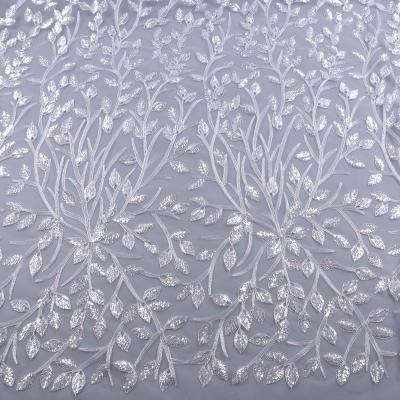 China Breathable Sequin Tulle Sequin Fabric 3mm White Concave Crystal Fabric Order Bridal Dress Fabric for sale