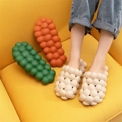 China Breathable Drop Shipping 2022 Spring And Summer Personality Bubble Fashion Massage Bottom Home Slippers Woman Mens Indoor Slippers for sale