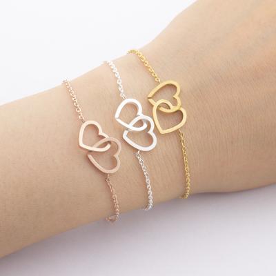 China Romantic Friendship Bracelet Heart Charm Bracelet Double Gold Plated Stainless Steel Heart Gift Bracelet for sale