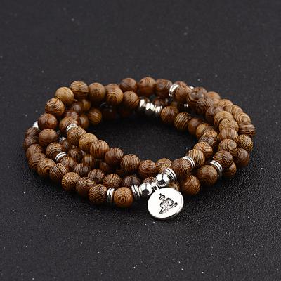 China Healing Bracelet Multilayer Yoga Wood Catholic OM Rosary Charm Lotus Bracelet Jewelry For Women Men for sale