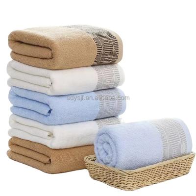 China 32 Ply Jacquard Hypoallergenic Adult Bath Towel 70*140 Back to Grid Home Plain Cotton Beach Towel for sale