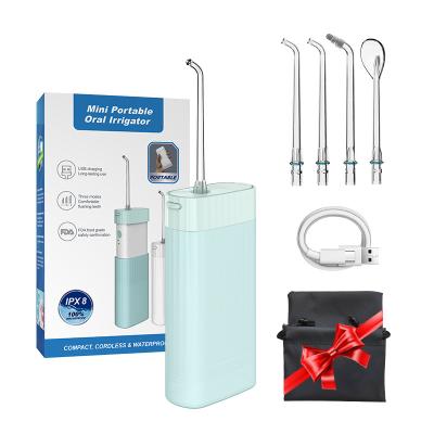 China Usb Travel Effectively 140ml Portable Dental Household Easy Rechargeable Irrigator Flosser Oral Cleaning Water Flosser Oral Water Flosser IPX7 3 for sale