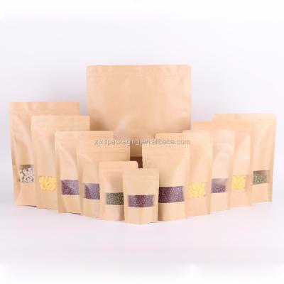 China Manufacture Recyclable Wholesale Stand Up Brown Kraft Paper Bag With Window for sale