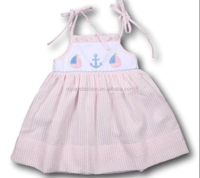 China Pale pink breathable cotton and sailboat seersucker smocked anchor applique strap dress for sale