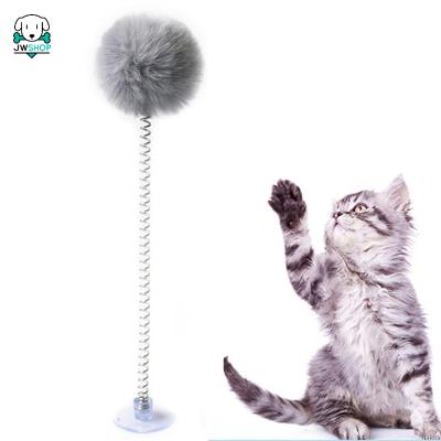 China Interactive Cat Toys Feather Funny Cat Pom Pom Ball Spring Bell Pet Viable Plastic Bottom Elastic Cats Products Sucker for sale