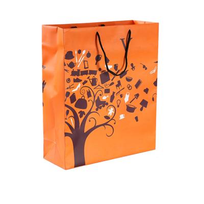 China New Material Design Recycled Portable Gift Paper Bag Packaging Bag Bouquet Chocolate Handbag for sale