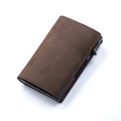 China Fashion Metal Rfid Automatic Minimalist Card Case Blocking Carbon Fiber Leather Auto Card Holder for sale