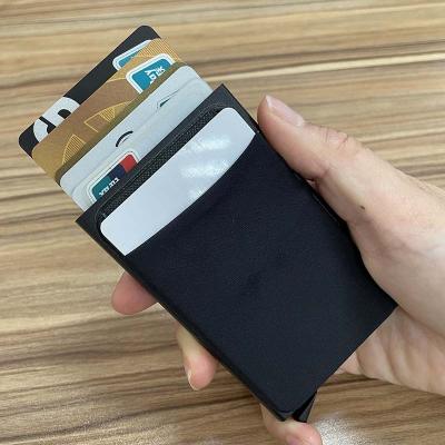 China Fashion Blocking Clutch Bifold Wallet With Card Pop Up Aluminum Credit Card Holder for sale