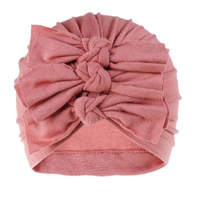 China Style Kids Breathable Warm Hats With Bowknots Cloth Colorful New Born Infant Beanie Baby Hats for sale