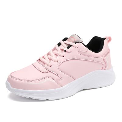 China New women's fitness light running shoes unique soft leather waterproof sports shoes autumn and winter small light white women's shoes for sale