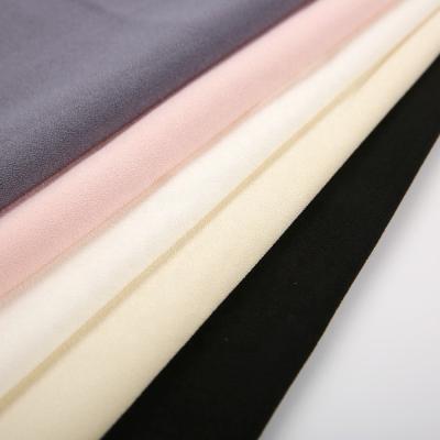 China Newest stretch fashion foam crepe fabrica what is dress 4 way stretch pant dress shirt fabric for sale