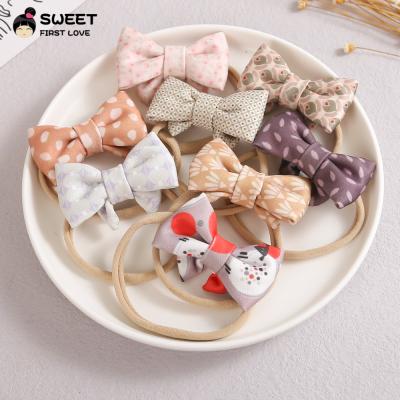 China European and American wholesale cheap organic tie cotton style baby headband hair and bows thick nylon baby for sale