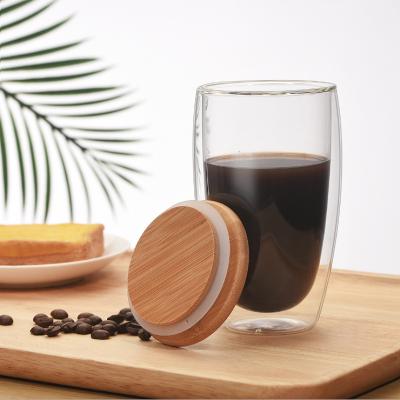 China Sustainable Double Wall Insulated Borosilicate Glass Coffee Mug Set Bamboo Glass Water Bottle for sale