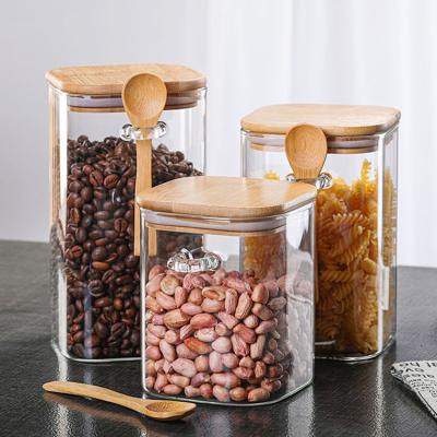 China Freshness Keeping High Quality Kitchen Jar Glass Container with Bamboo Lid for Spice Storage with Wooden Spoon for sale