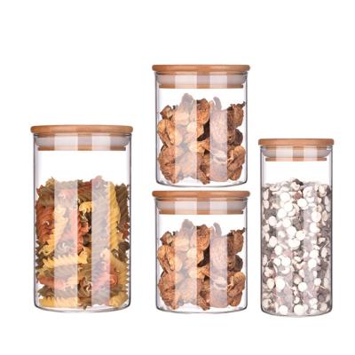 China Freshness Preservation Free Match Full Sizes Borosilicate Glass Airtight Storage Jar High With Bamboo Lid Glass Jar Set for sale